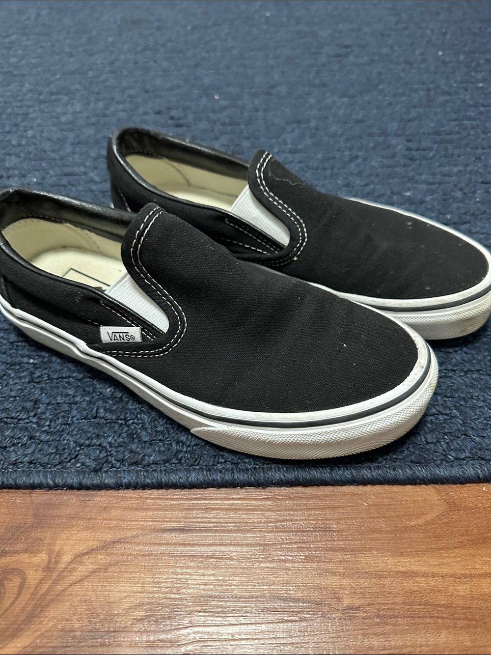 Vans Black & White Slip-On Canvas Sneakers